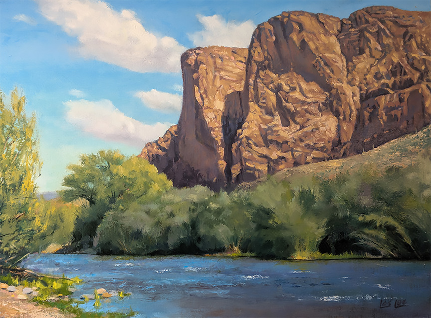 Painting of a river with desert mountains